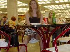 Redhead chick showing her pussy and long legs in stockings. Image 7
