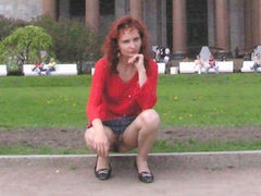 My hot redhead exwife posing naked for my camera on the streets exposing her small tits and shaved pussy. Image 3