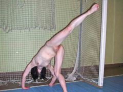 This is my EXGF exposing her shaved pussy in the school gym. Image 1