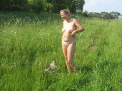 My plump exwife showing her nude body sitting on my car. Image 9