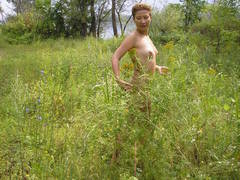 These are the secret nude pictures of my naughty exwife posing outdoors. Image 7