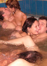 Horny couples fucking and changing partners in the pool Image 6