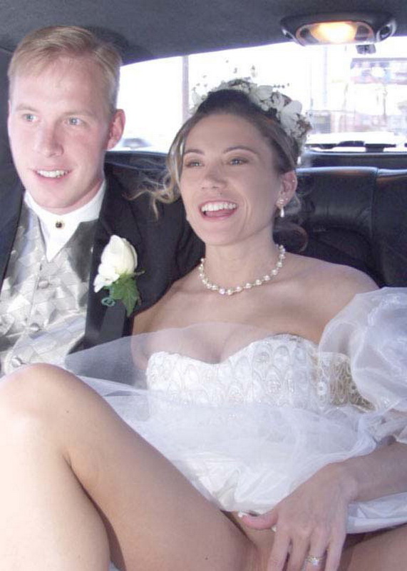 Beautiful bride showing her pussy in the back of the car picture