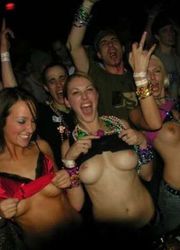 Young girls gets drunk and show their springy boobs Image 3