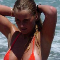 Posing naked on the beach